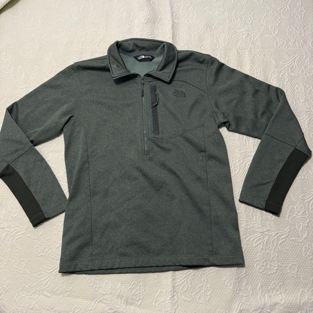 Dark green Northface quarter zip jacket. Size medium.